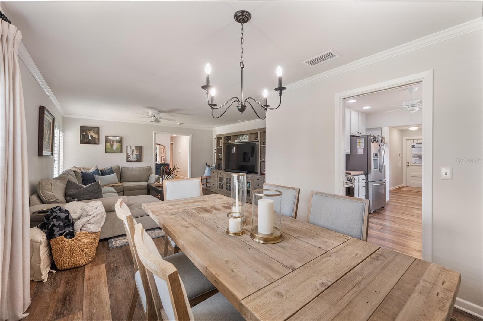 The formal dining room as it flows into the beautifully updated eat in kitchen. - 1211 HUNT AVE, LAKELAND