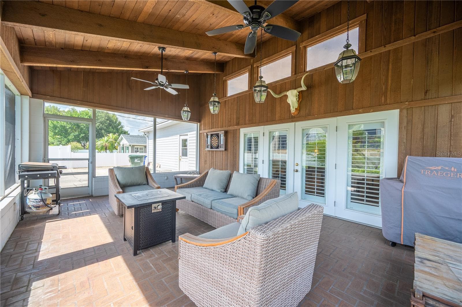 This stunning rear screened covered patio is perfect for entertaining ,open the french doors that lead to the game room and there is fun all around. - 1211 HUNT AVE, LAKELAND
