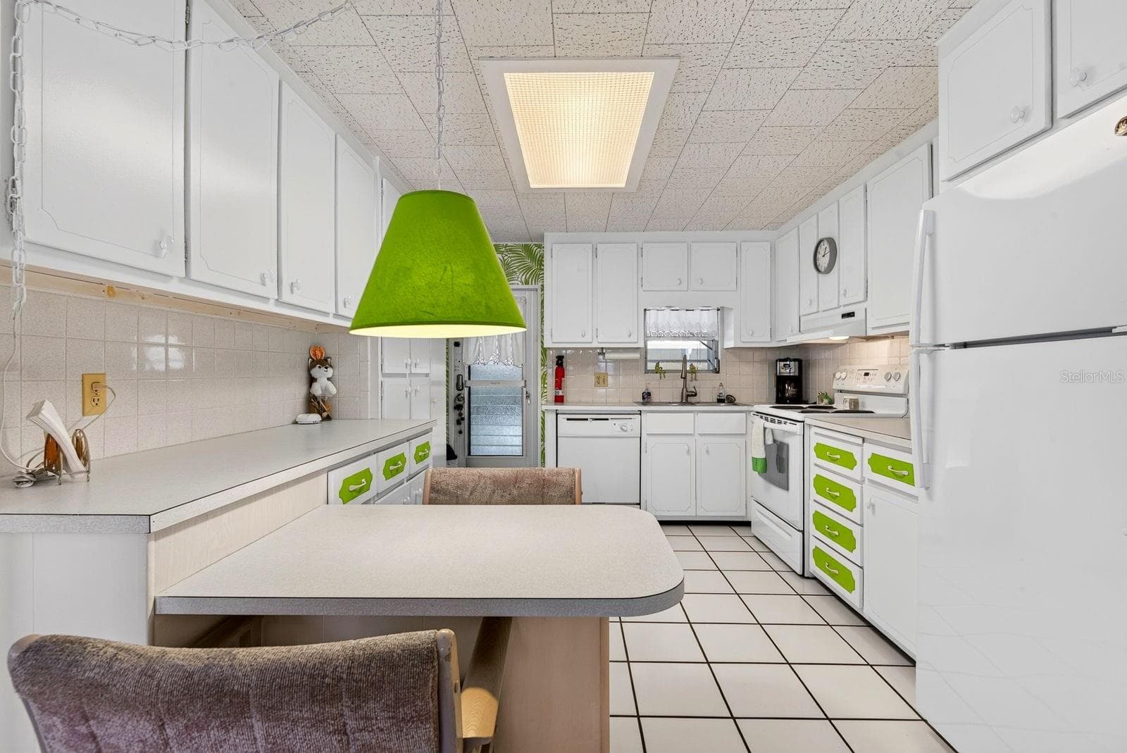 Kitchen showing tons of cabinets and counter space - 37 CABALLO WAY, BRADENTON