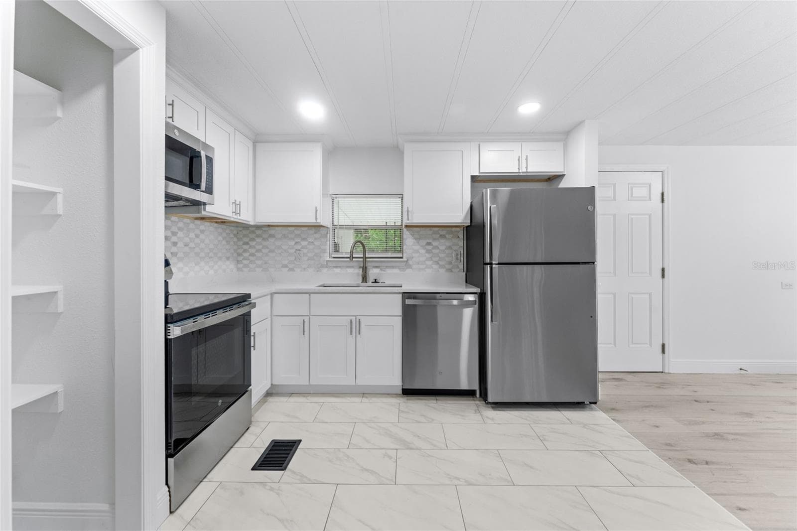 Manufactured Home at 130 FLORENCE BLVD, DEBARY, photo 3 of 20