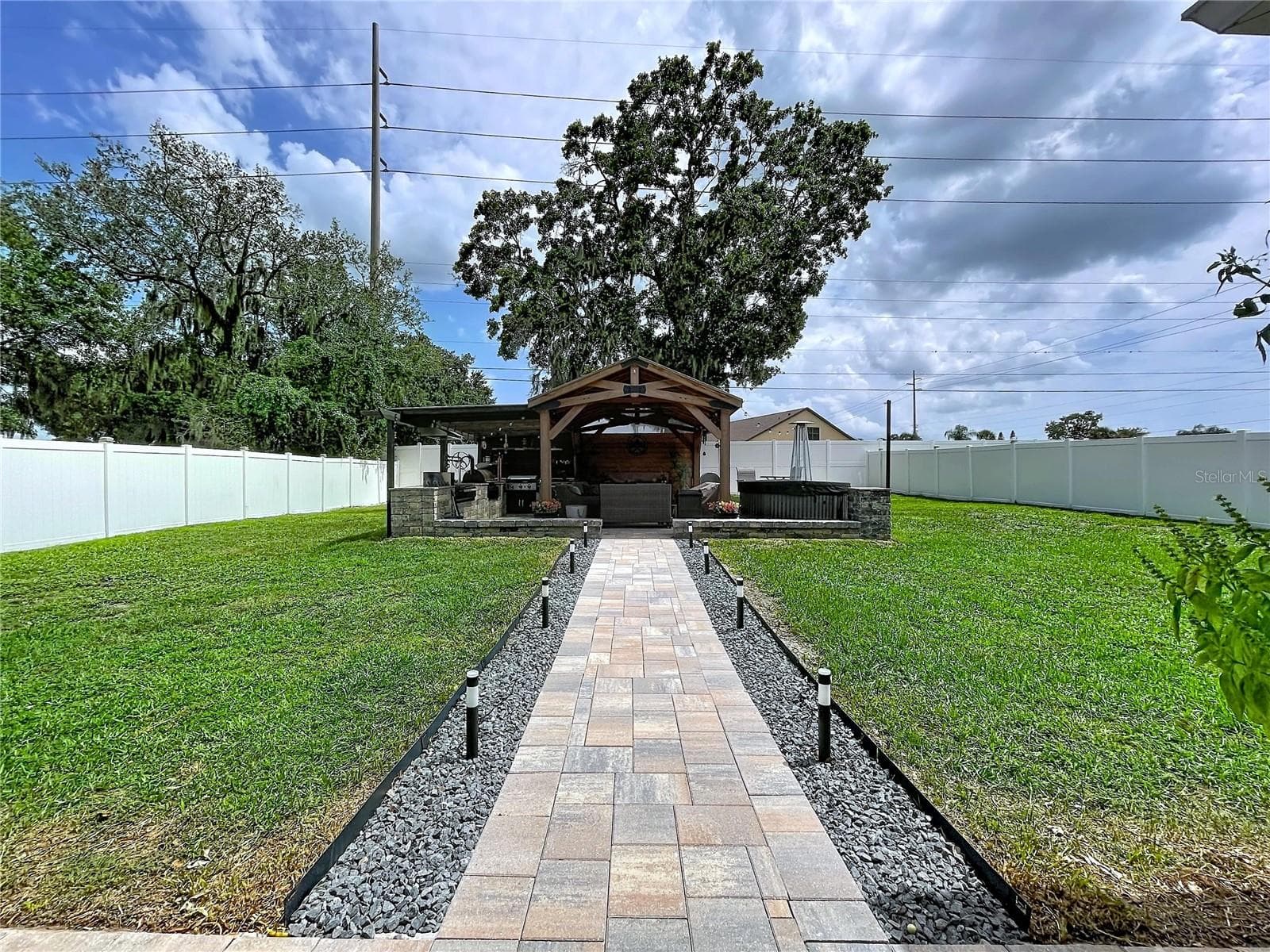 Outside Entertainment area with fenced backyard - 1748 BROOKSTONE WAY, PLANT CITY