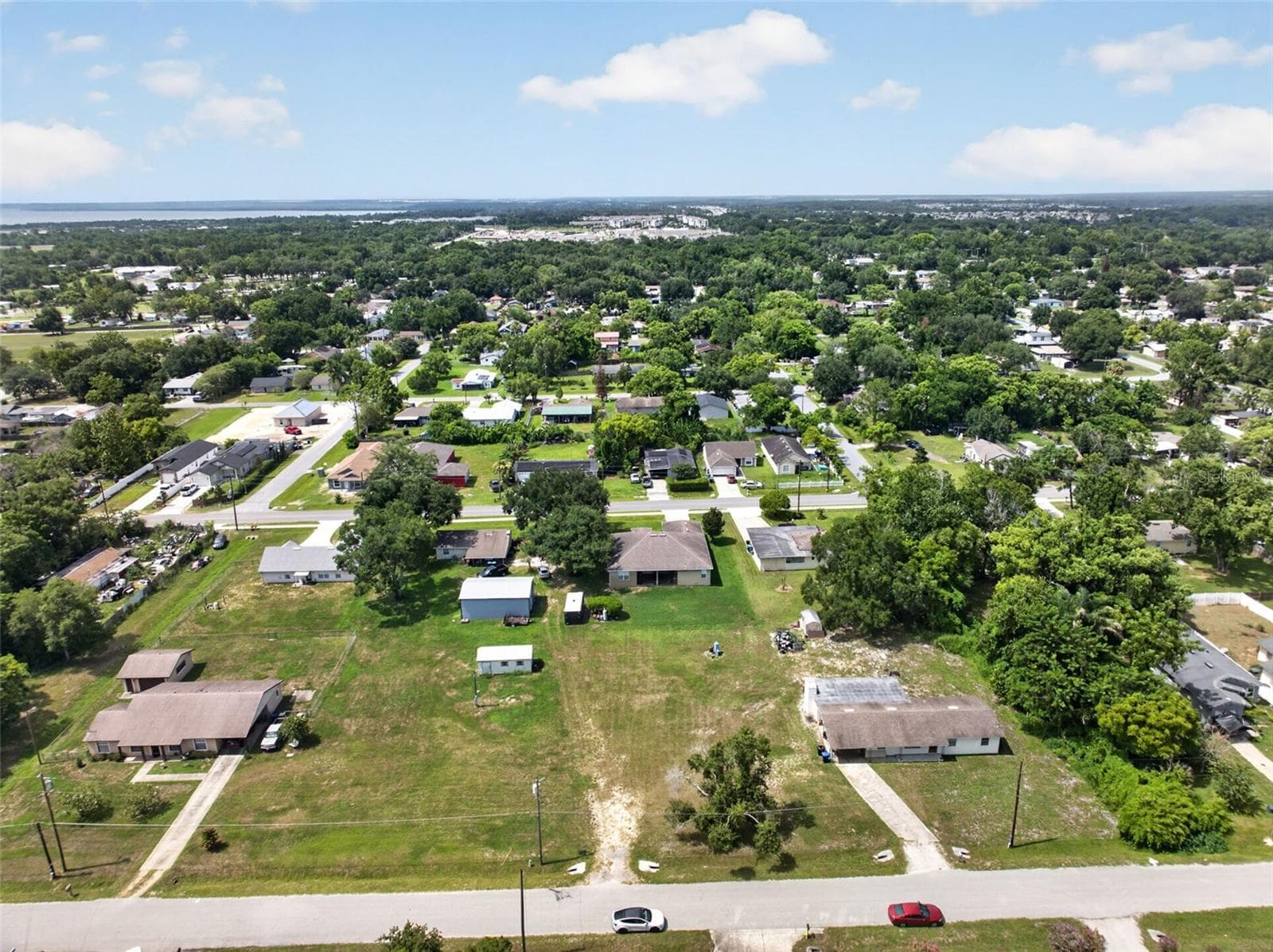 Aerial view of the parcel boundary and surrounding block. - 212 15TH AVE, OCOEE