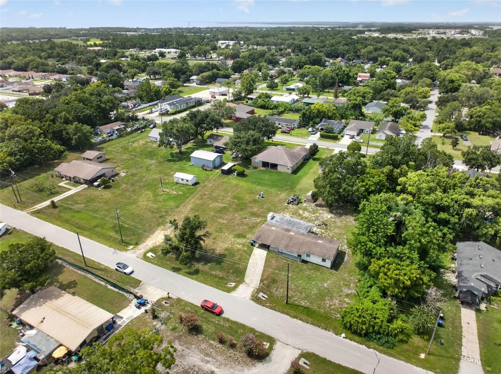 Aerial view of the parcel boundary and surrounding block. - 212 15TH AVE, OCOEE