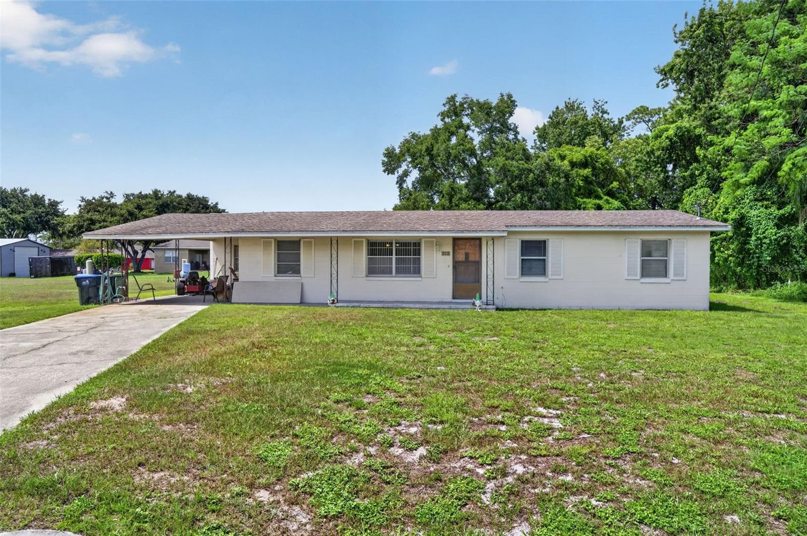 Additional front view showing full lot frontage along 15th Ave. - 212 15TH AVE, OCOEE