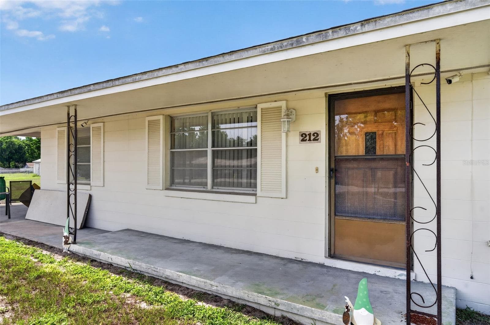 Front entry and covered stoop. - 212 15TH AVE, OCOEE