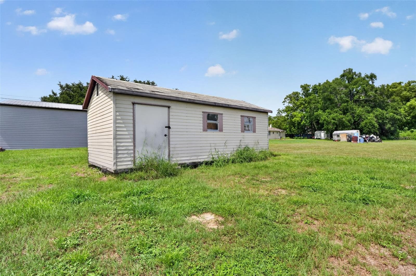 Existing storage shed on the property. - 212 15TH AVE, OCOEE