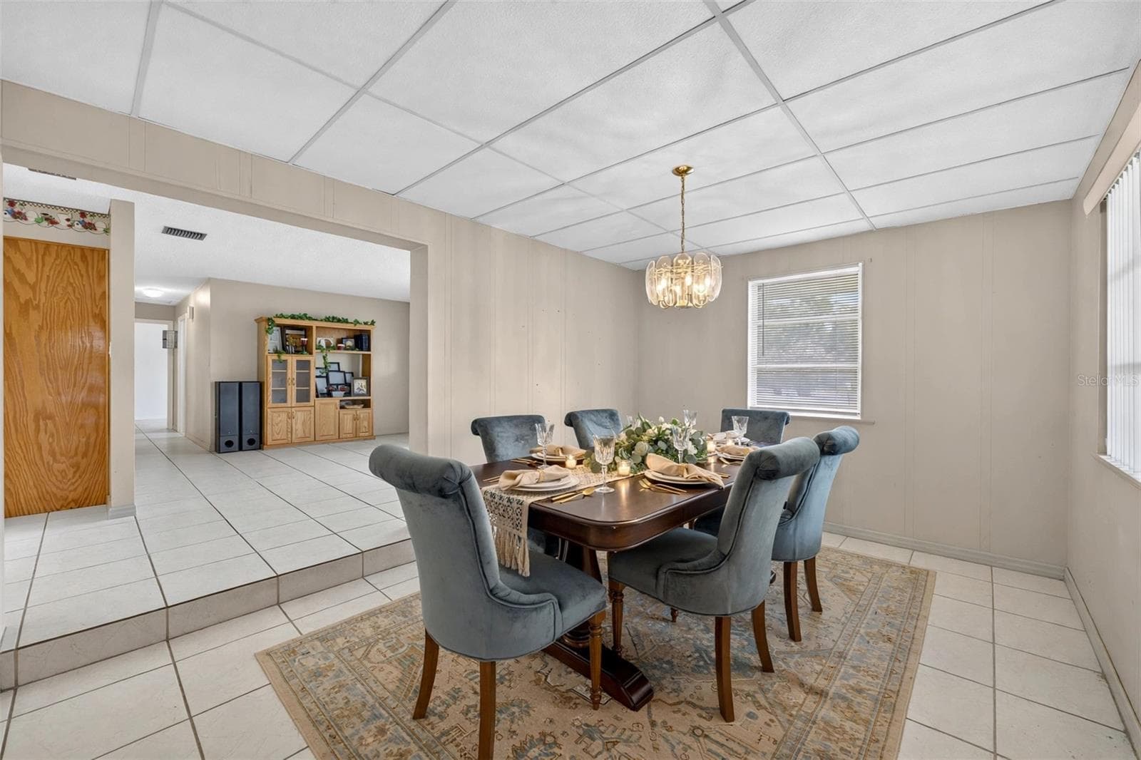 AI Staged Dining Room - 212 15TH AVE, OCOEE