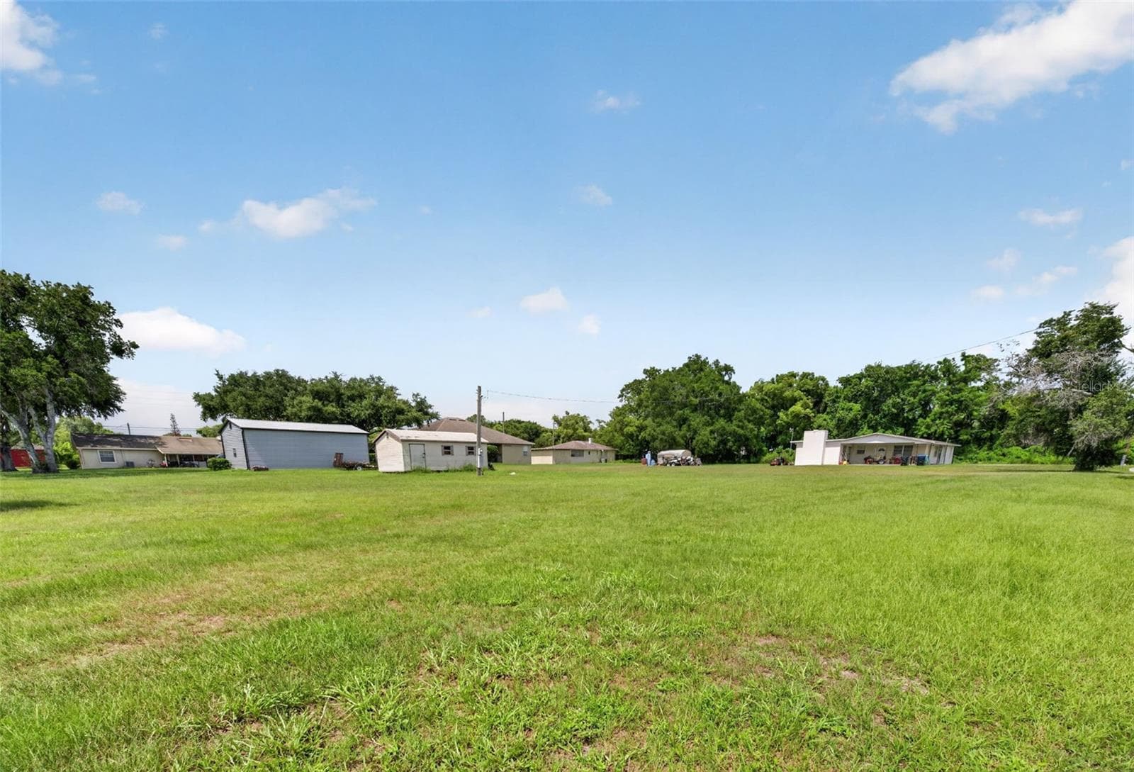 Wide yard view — room for additional lots if home is retained. - 212 15TH AVE, OCOEE