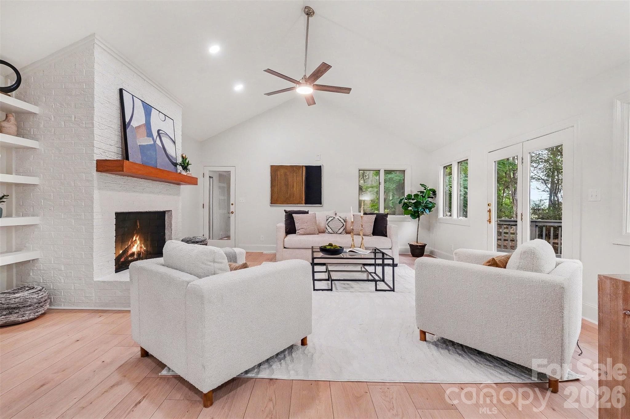 Family movie nights will be special around the fireplace. - 5042 Marci Lane, Belmont