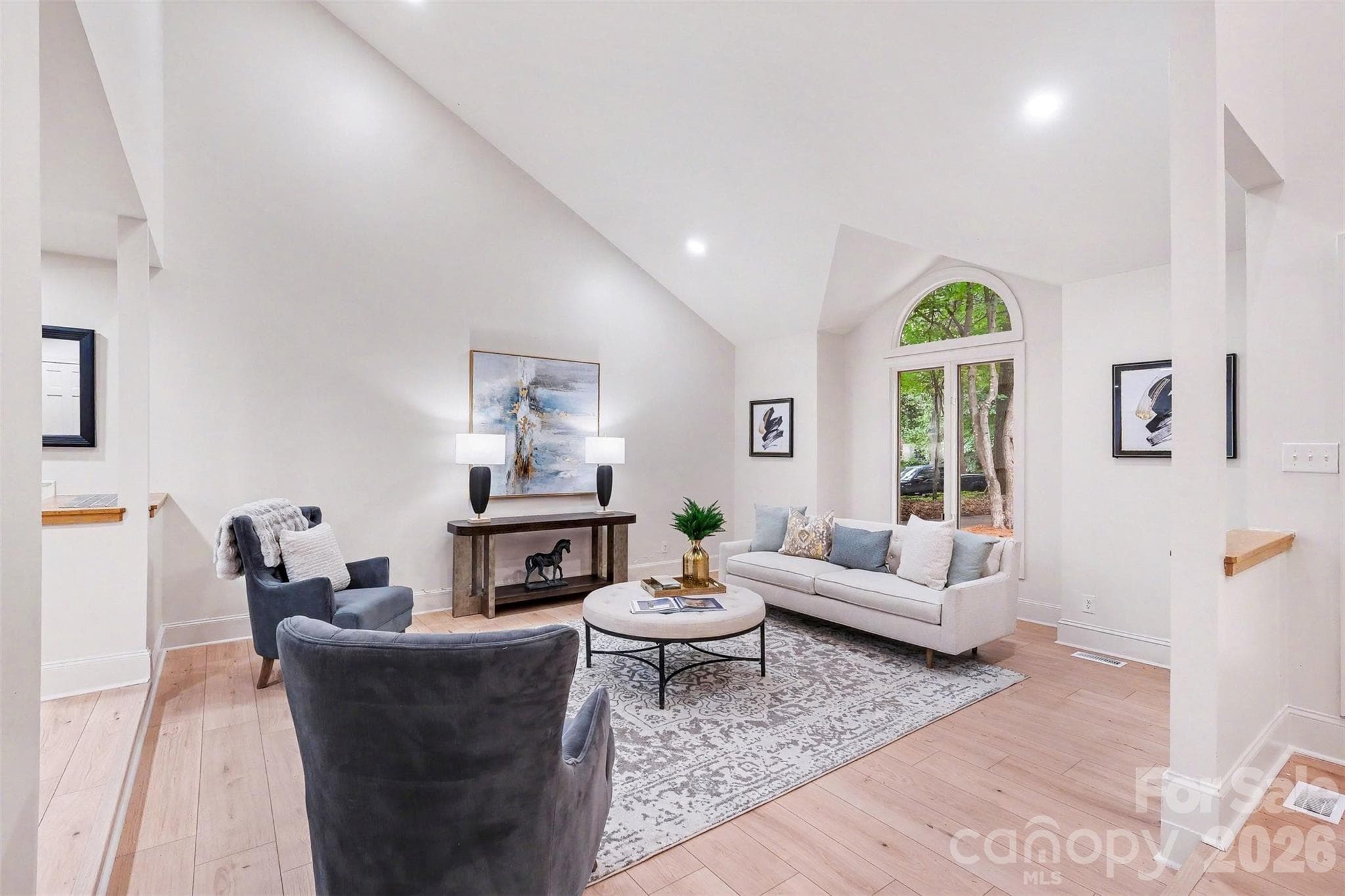 Need another "living space"?!? Yes, this is your formal living room inside the front door, which is large 17 1/2 by 15 1/2 and feels even larger thanks to vaulted ceilings. - 5042 Marci Lane, Belmont