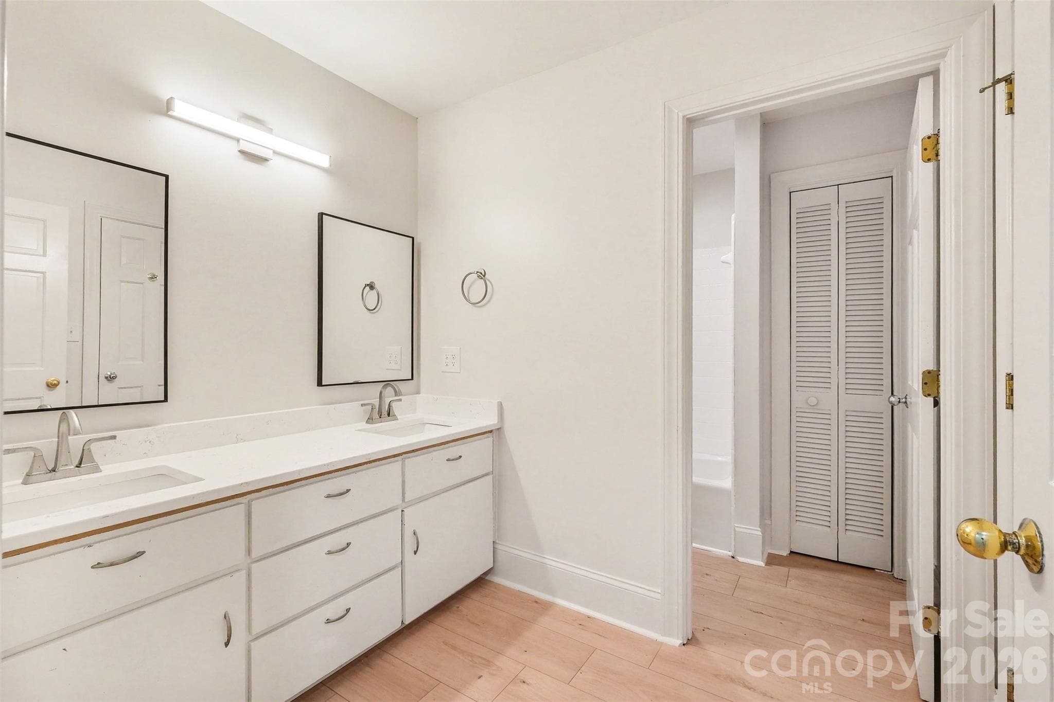 Your new guest bathroom on the upper level with a new double-vanity ... - 5042 Marci Lane, Belmont