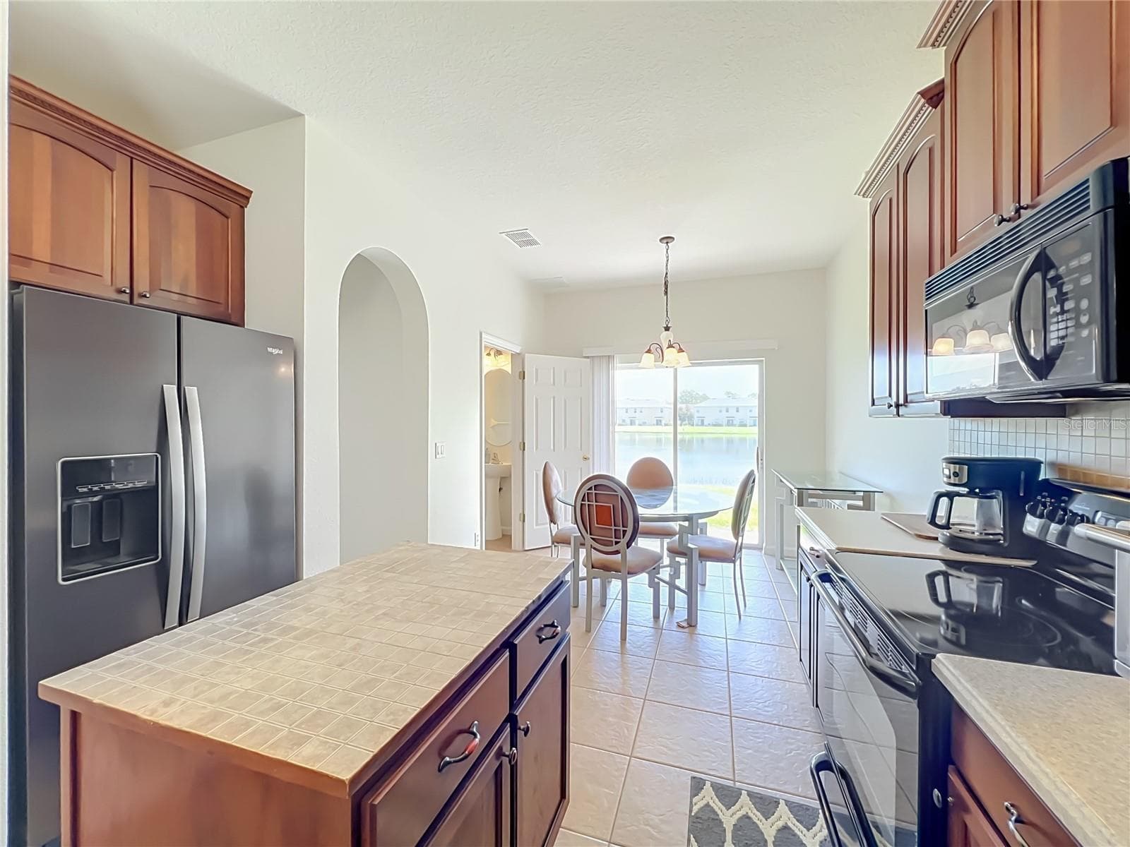 Dinette area, 1/2 bath and master on this floor. - 16543 CEDAR CREST DR, ORLANDO