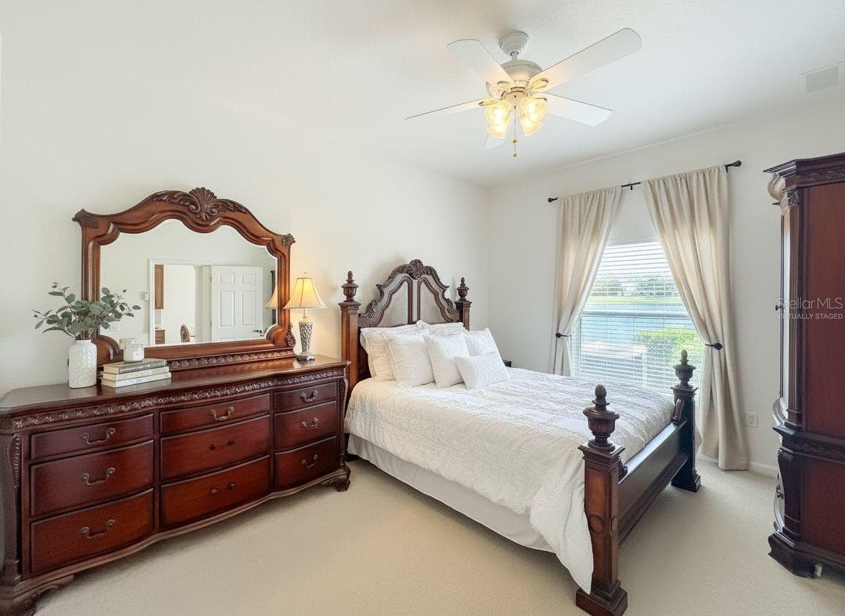 Master bedroom - virtually staged decoration - 16543 CEDAR CREST DR, ORLANDO
