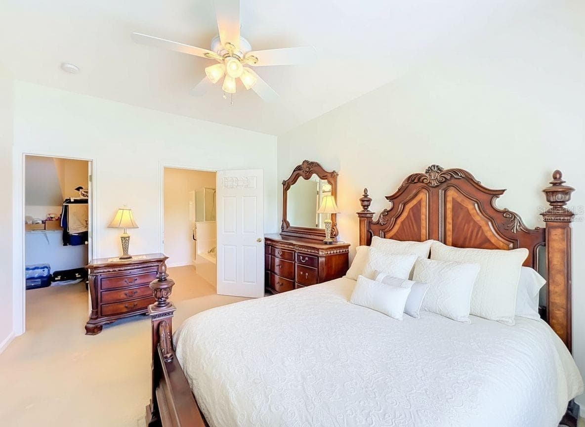 Master bedroom - virtually staged decor - 16543 CEDAR CREST DR, ORLANDO