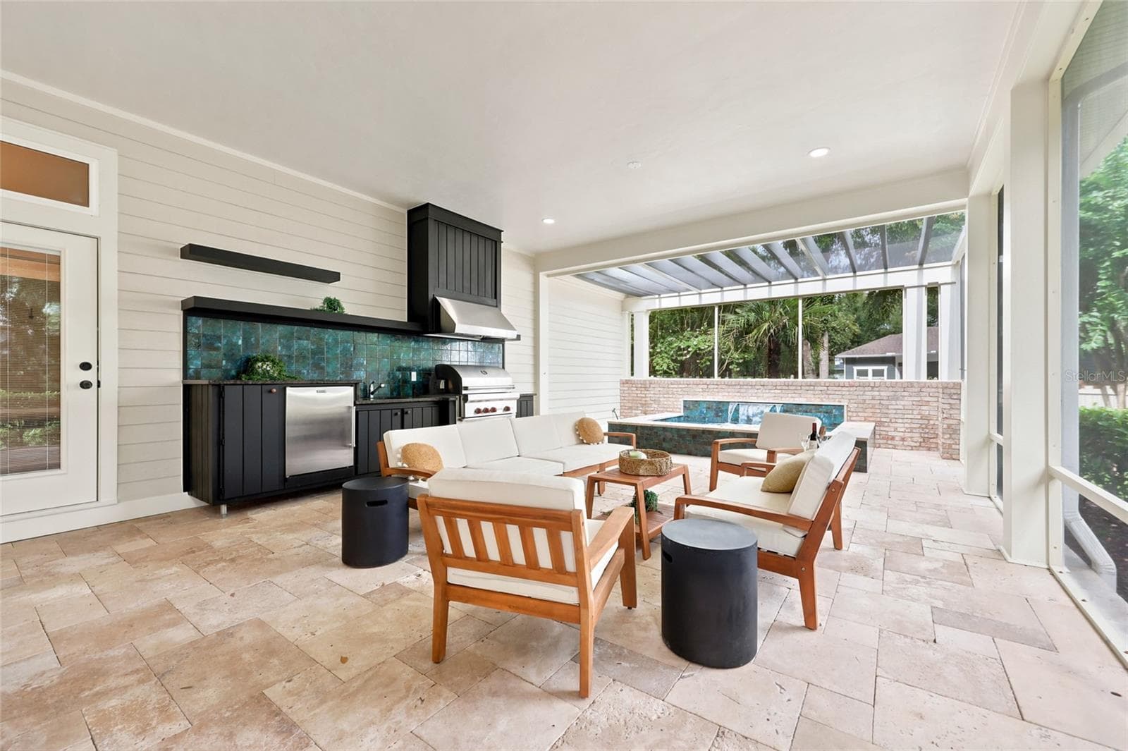 Outdoor kitchen and seating - 774 SW 134TH WAY, NEWBERRY