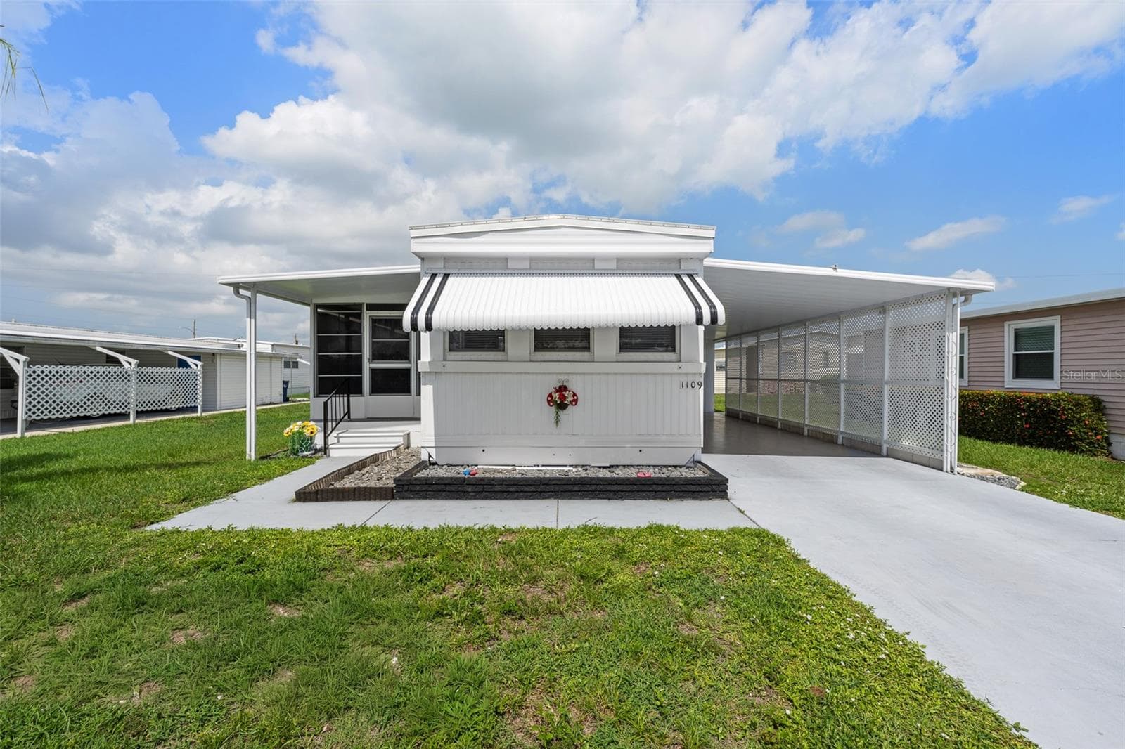 Mobile Home at 1109 45TH AVE E, ELLENTON, photo 2 of 35