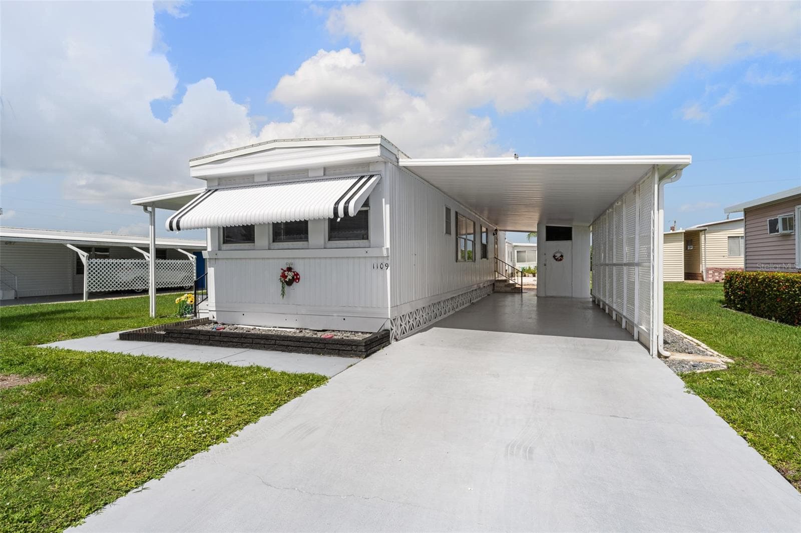 Mobile Home at 1109 45TH AVE E, ELLENTON, photo 3 of 35