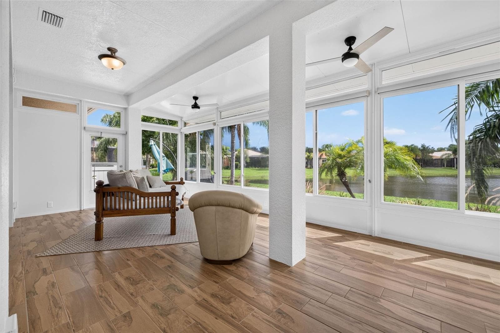 heated and cooled florida room - 15929 GOLDEN LAKES DR, WIMAUMA