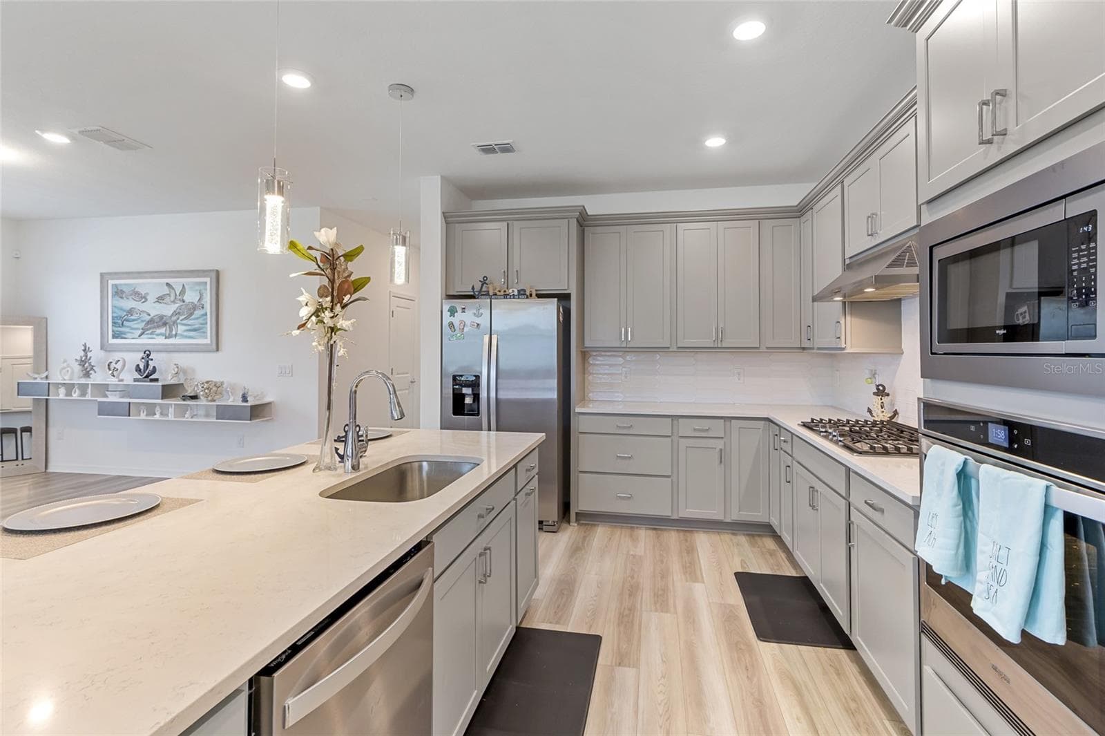 built in wall unit for displaying your personal items, beautiful luxury vinyl flooring - 3009 61ST DR E, ELLENTON