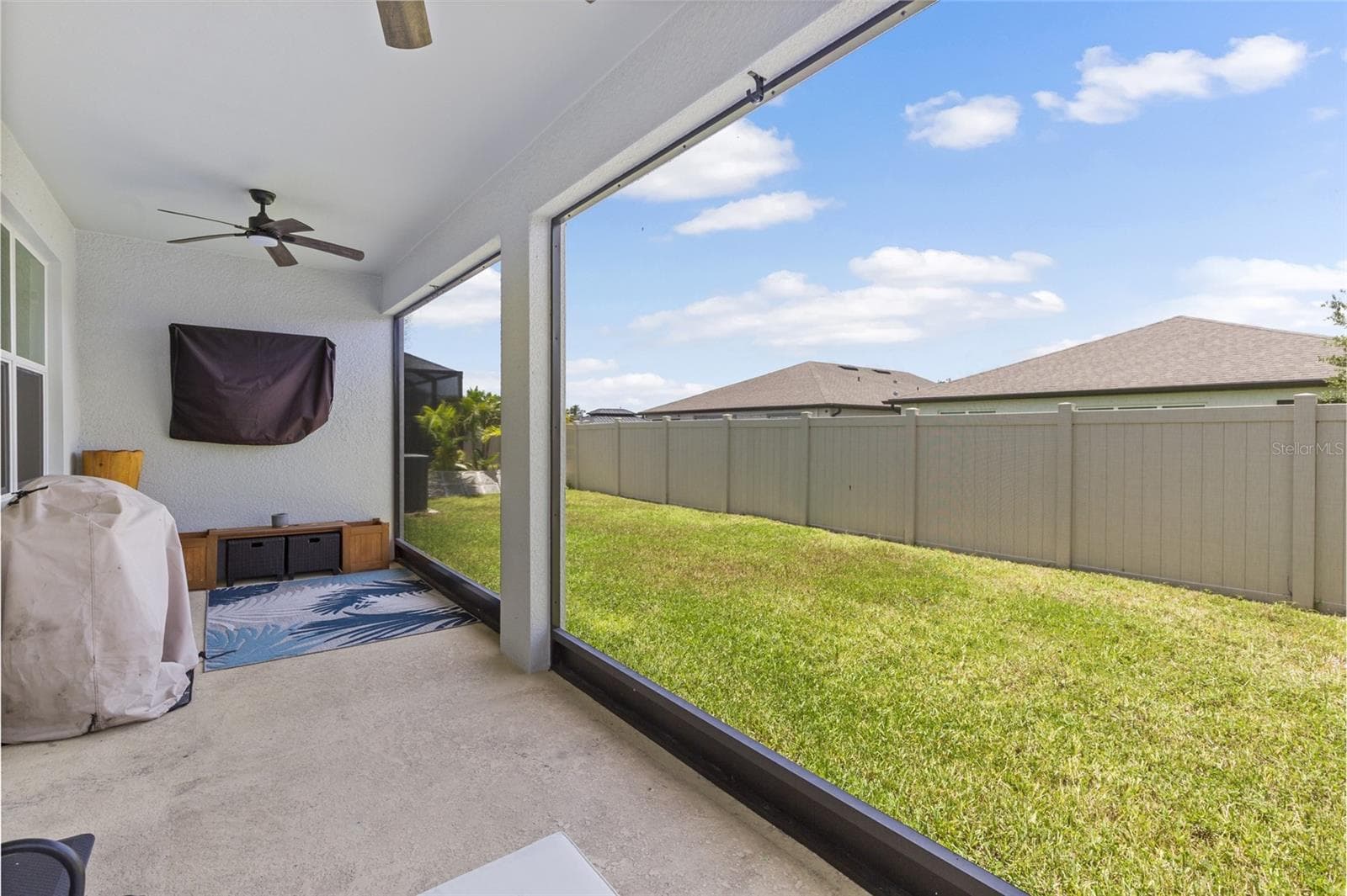 Wonderful, screened porch. 6' privacy fence being installed prior to close. They are friends with neighbor and didn't want a fence but will install. - 3009 61ST DR E, ELLENTON