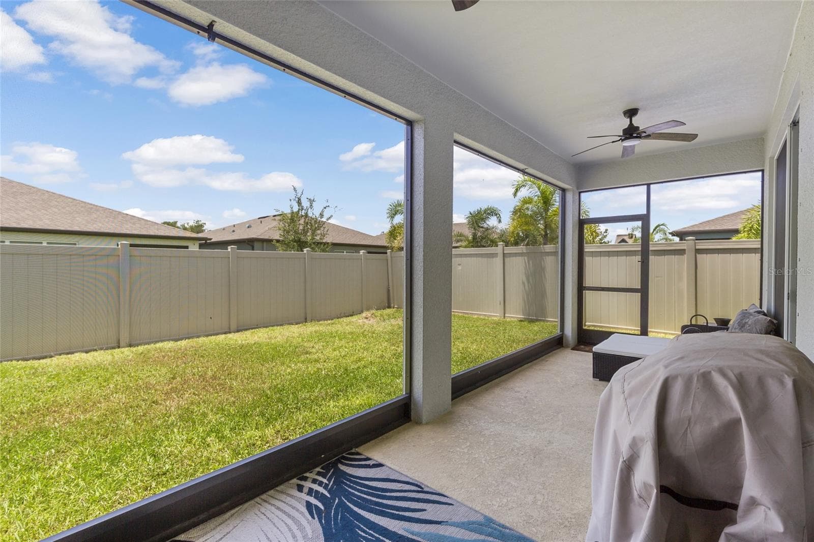 another view of porch and that fencing will be added to the other side prior to close. - 3009 61ST DR E, ELLENTON