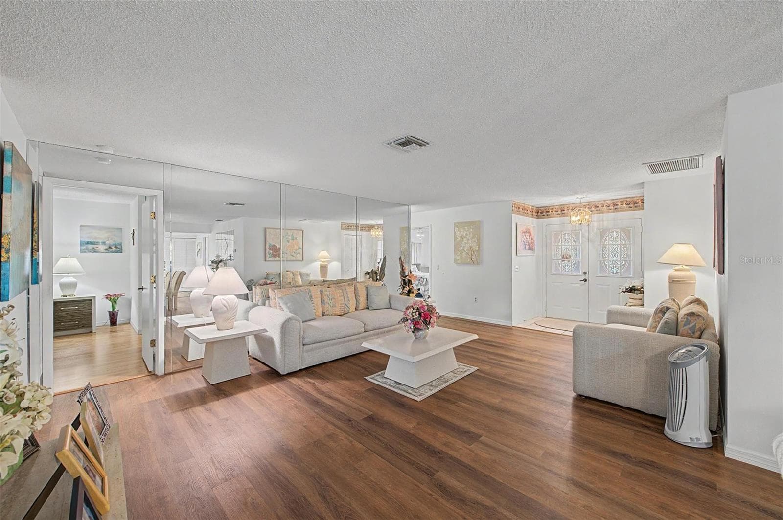 Living Room looking toward front door. - 4709 PORTLAND MANOR DR, NEW PORT RICHEY