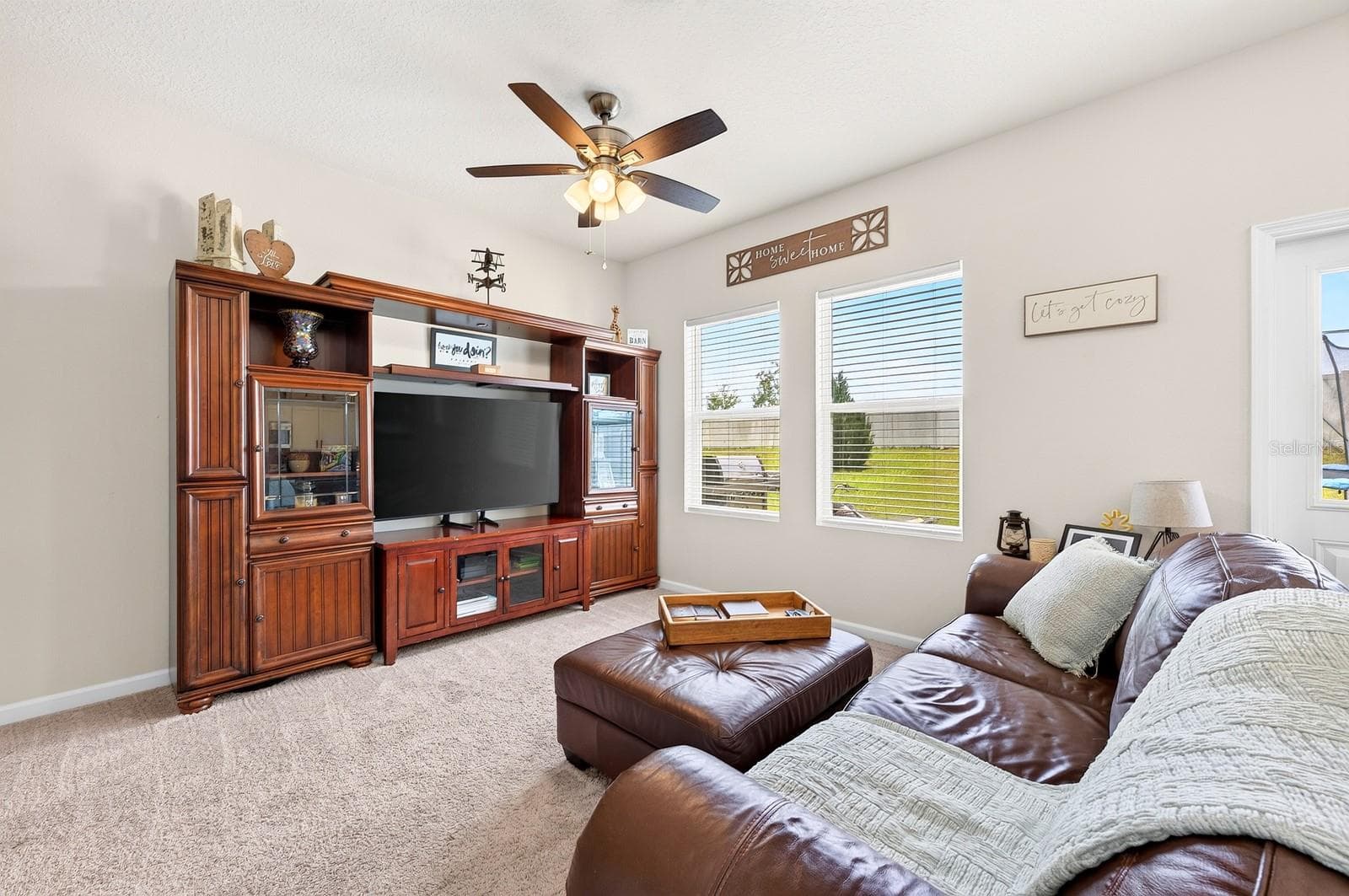 Conveniently adjacent to the Kitchen, the expansive Living Room invites connection and comfort. - 1961 HEMINGWAY CIR, GROVELAND