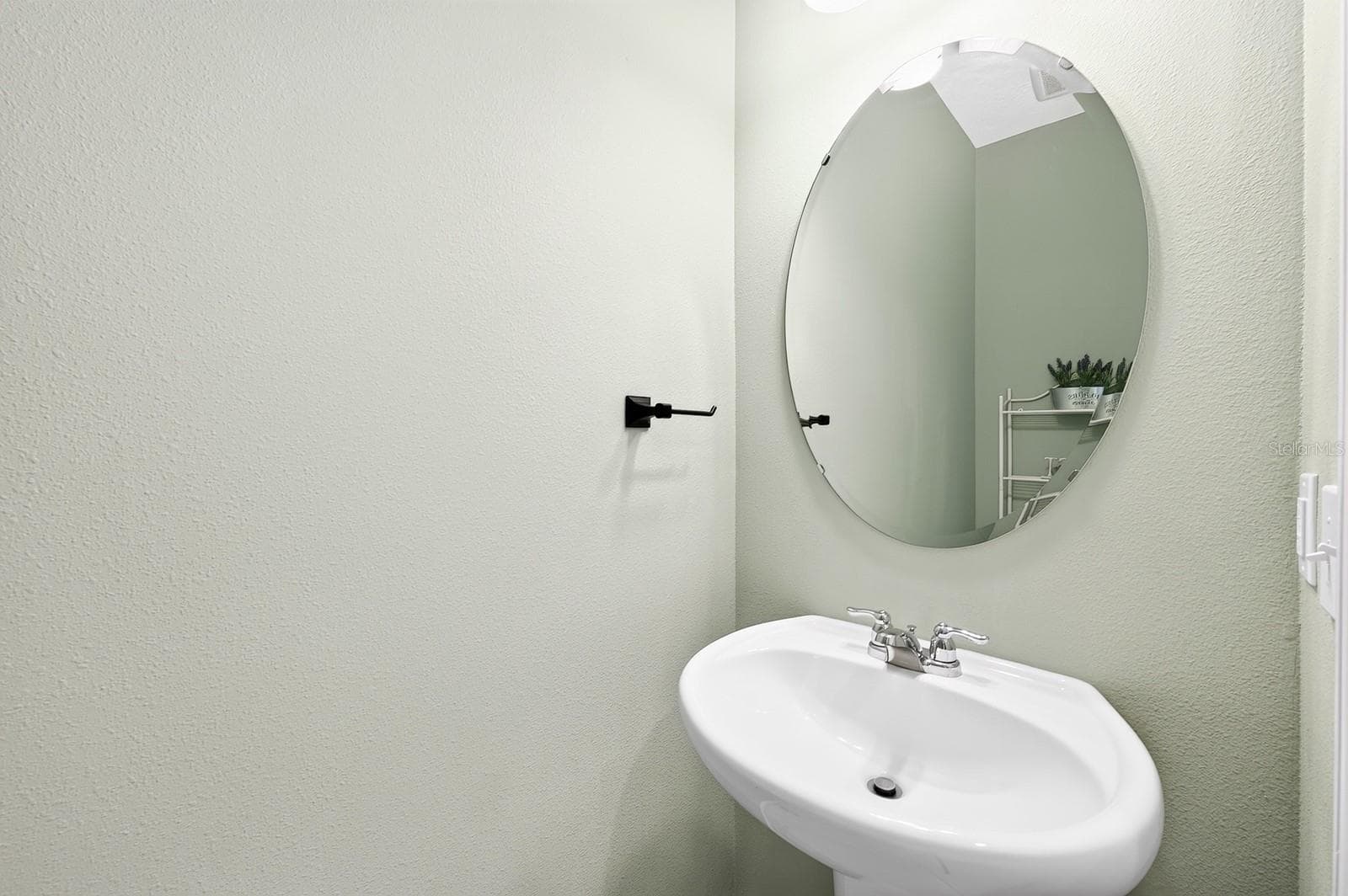 A convenient half bath completes the first floor. - 1961 HEMINGWAY CIR, GROVELAND