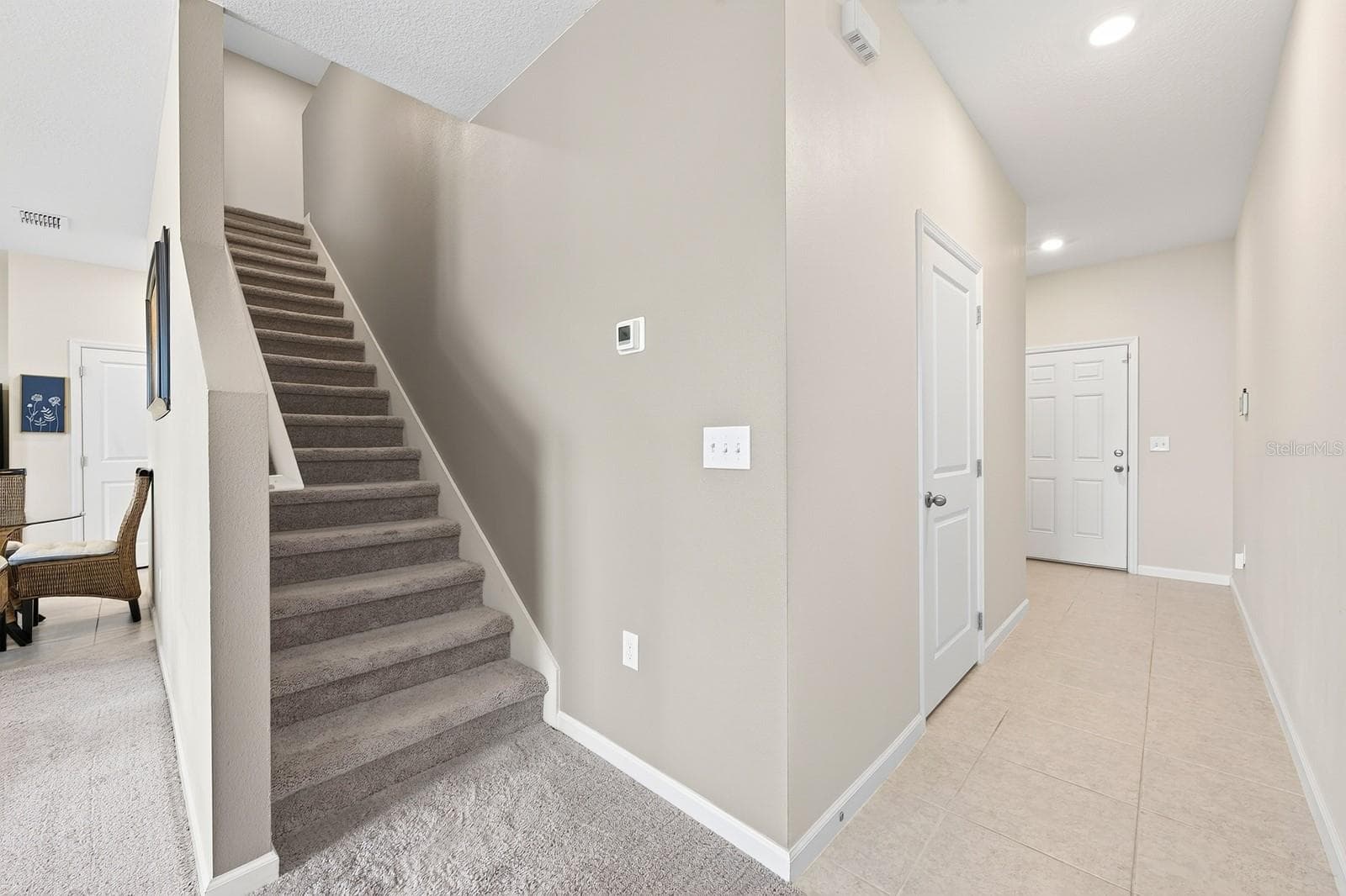 Upstairs, all three bedrooms provide a comfortable retreat with PLUSH CARPETING and generous closet space. - 1961 HEMINGWAY CIR, GROVELAND