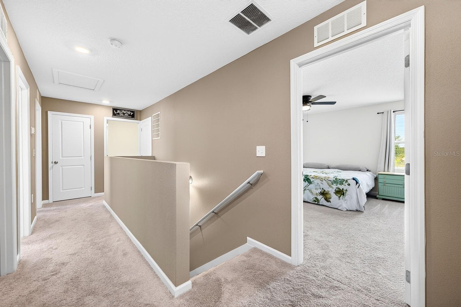 Upstairs, all three bedrooms provide a comfortable retreat with PLUSH CARPETING and generous closet space. - 1961 HEMINGWAY CIR, GROVELAND