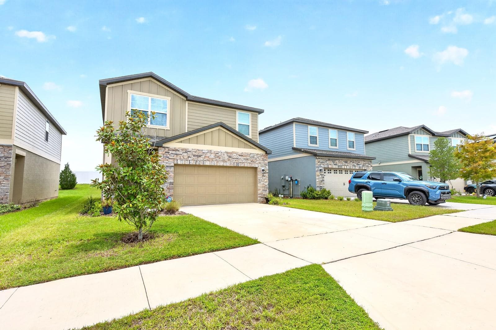 Built in 2023, this MOVE-IN READY residence offers all the benefits of new construction—without the wait! - 1961 HEMINGWAY CIR, GROVELAND