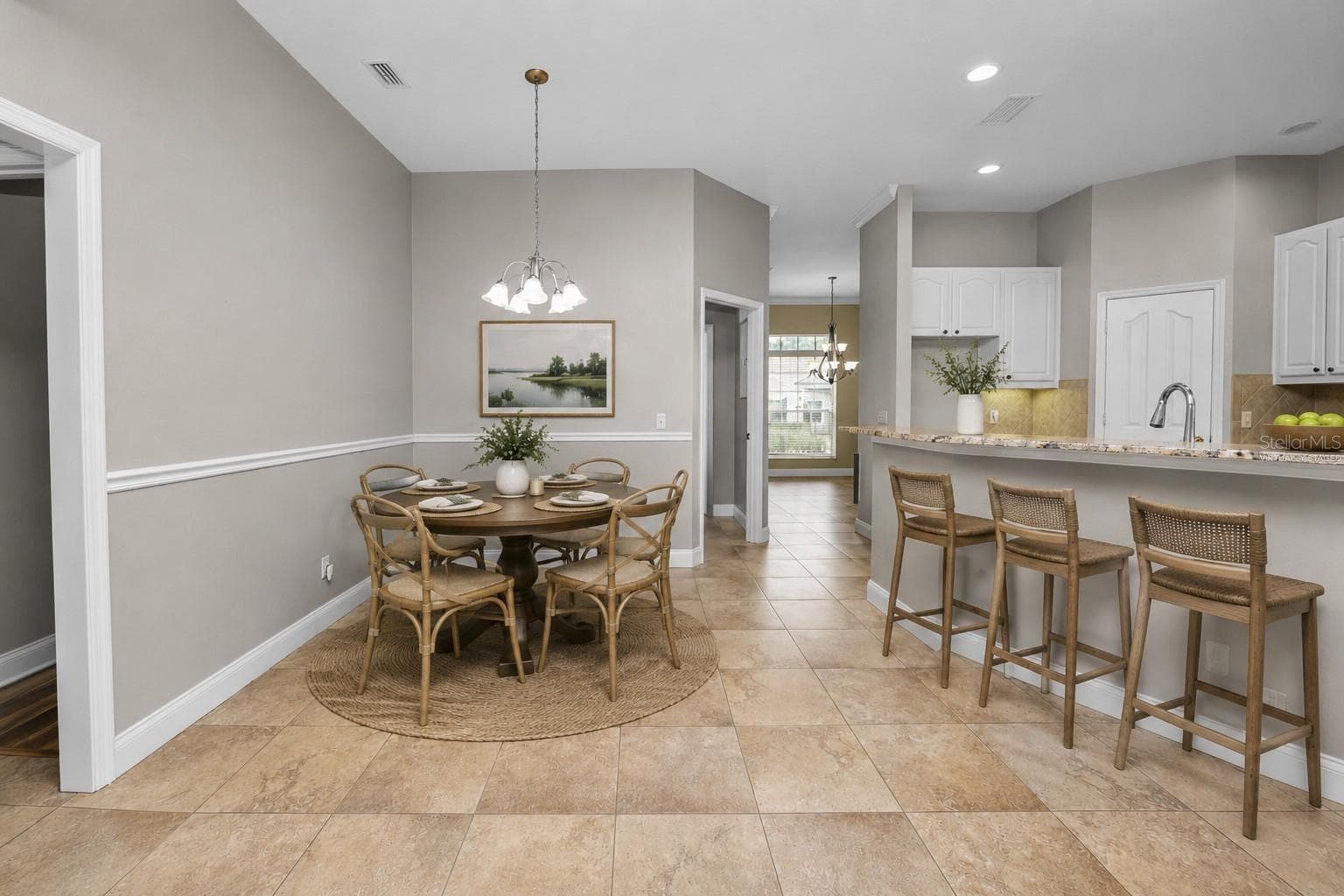 Virtually staged eat-in kitchen - 3333 HAWKS RIDGE DR, LAKELAND