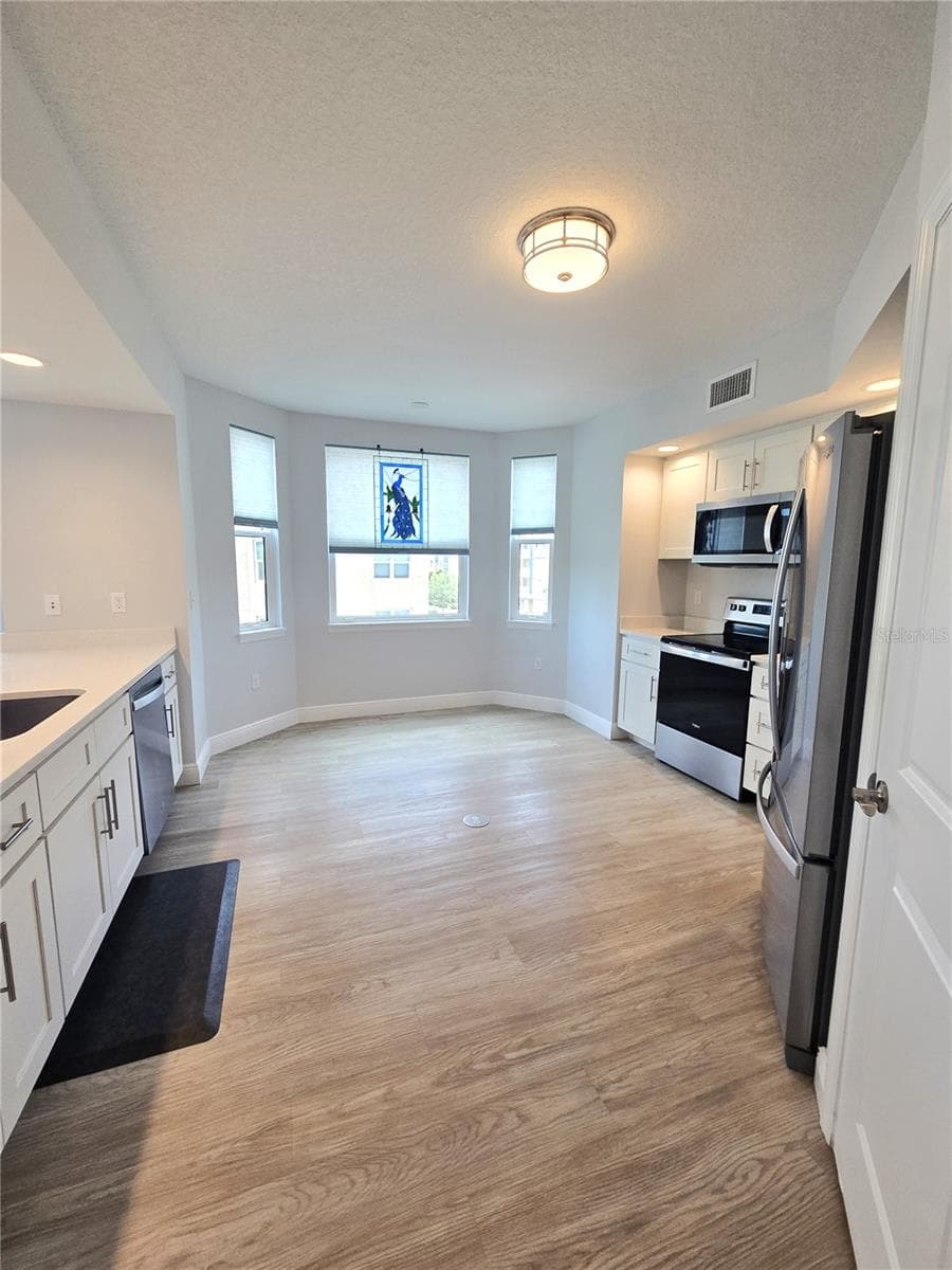 Kitchen with breakfast nook. - 960 STARKEY RD #9206, LARGO