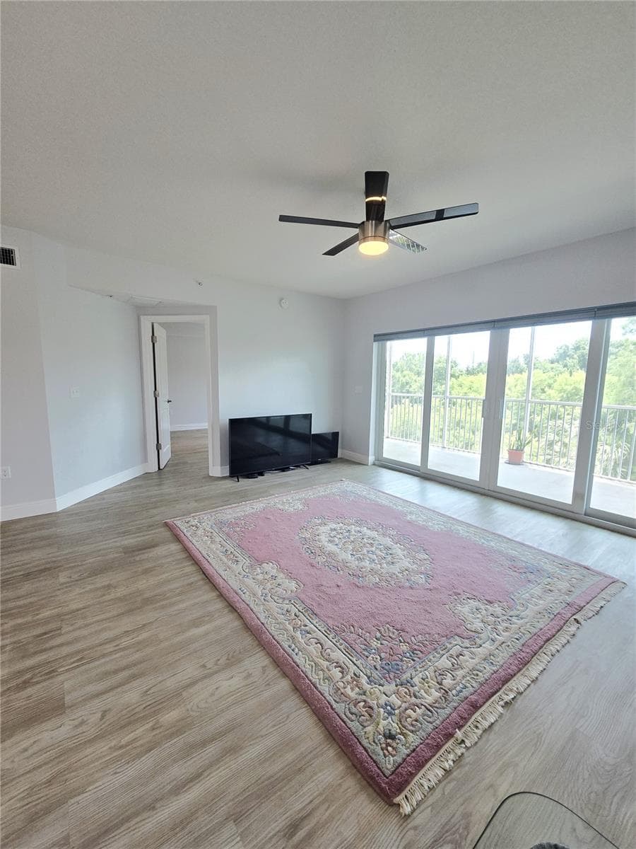 So much light in the living area. - 960 STARKEY RD #9206, LARGO