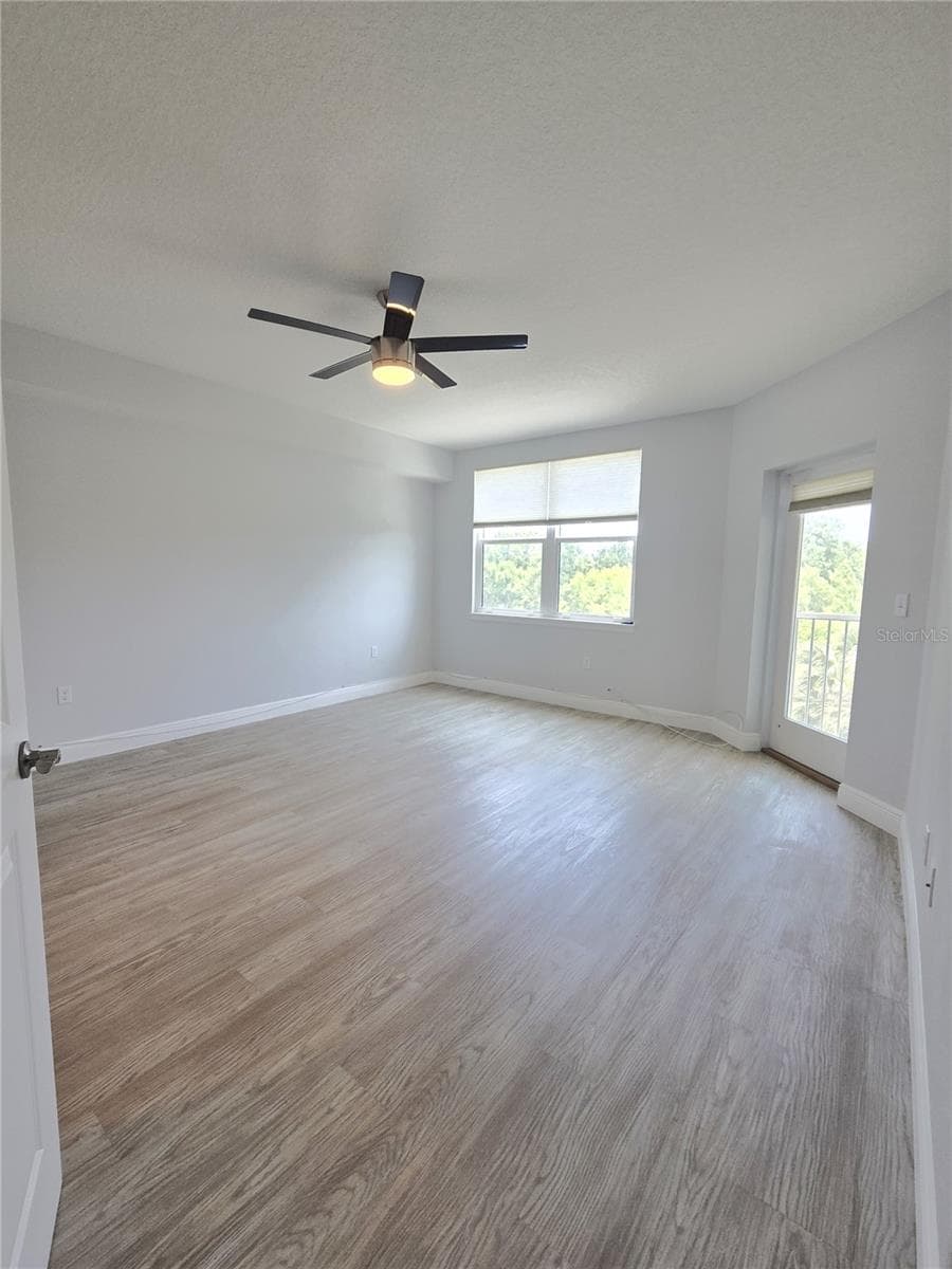 The large Owner's Suite has access to the back patio. - 960 STARKEY RD #9206, LARGO