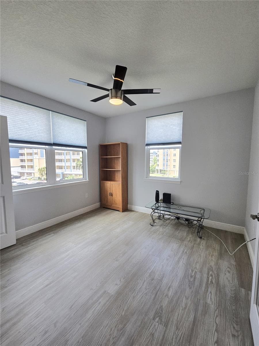 Bedroom 2 has two French doors, perfect for an office or guest bedroom. - 960 STARKEY RD #9206, LARGO