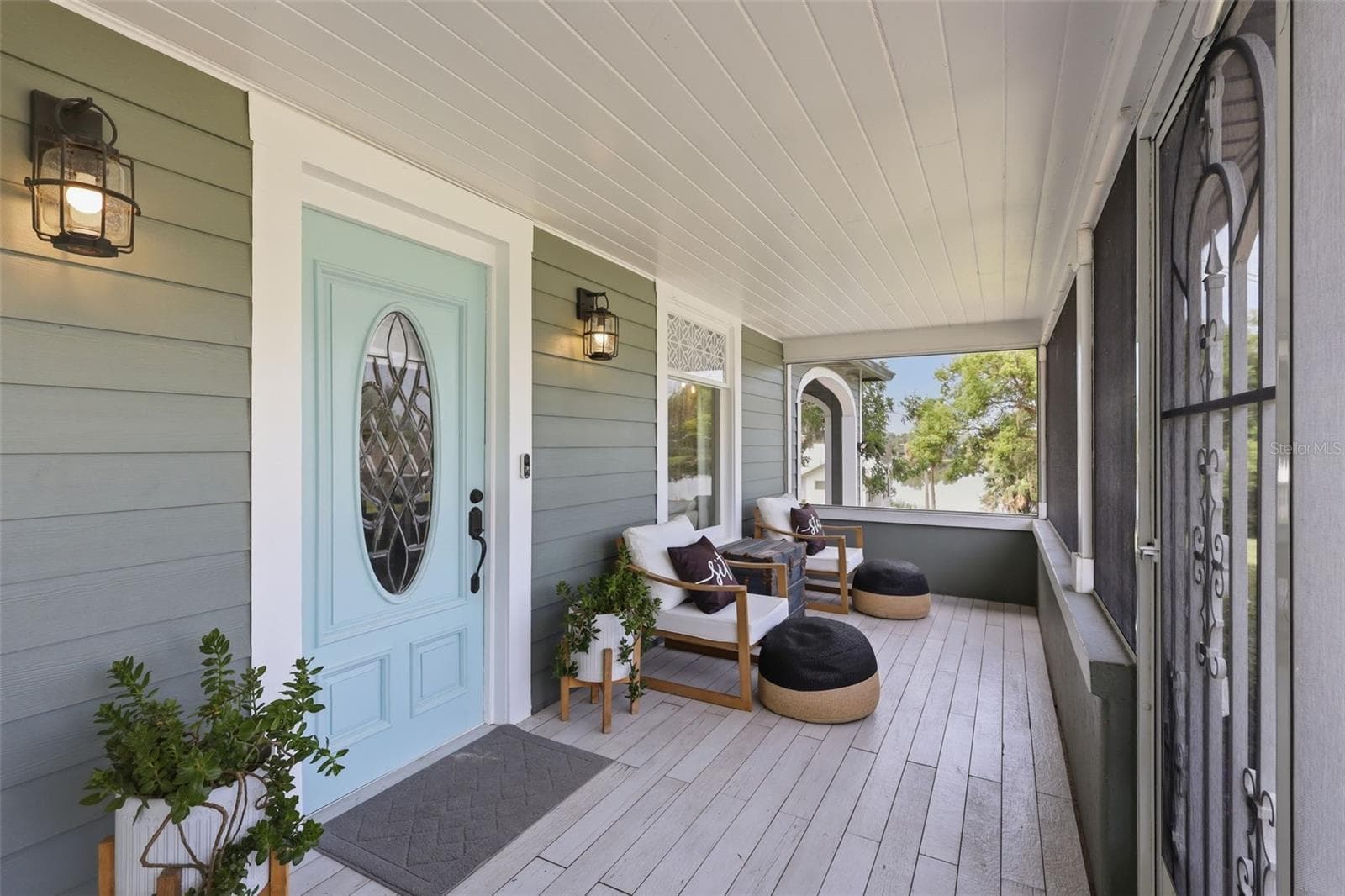 Front screened porch. - 47 DAVIS AVE, UMATILLA