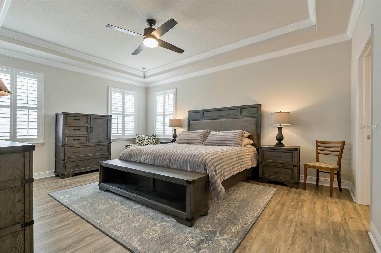 Primary Suite with Tray Ceilings & Crown Molding! - 597 OZONA VILLAGE DR, PALM HARBOR
