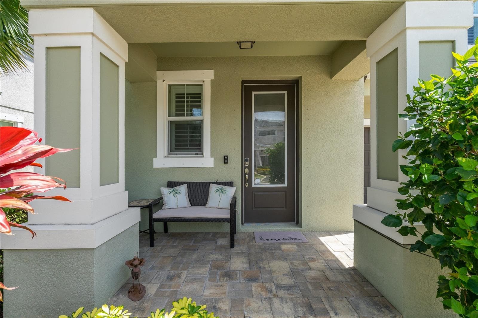 Covered Front Patio! - 597 OZONA VILLAGE DR, PALM HARBOR