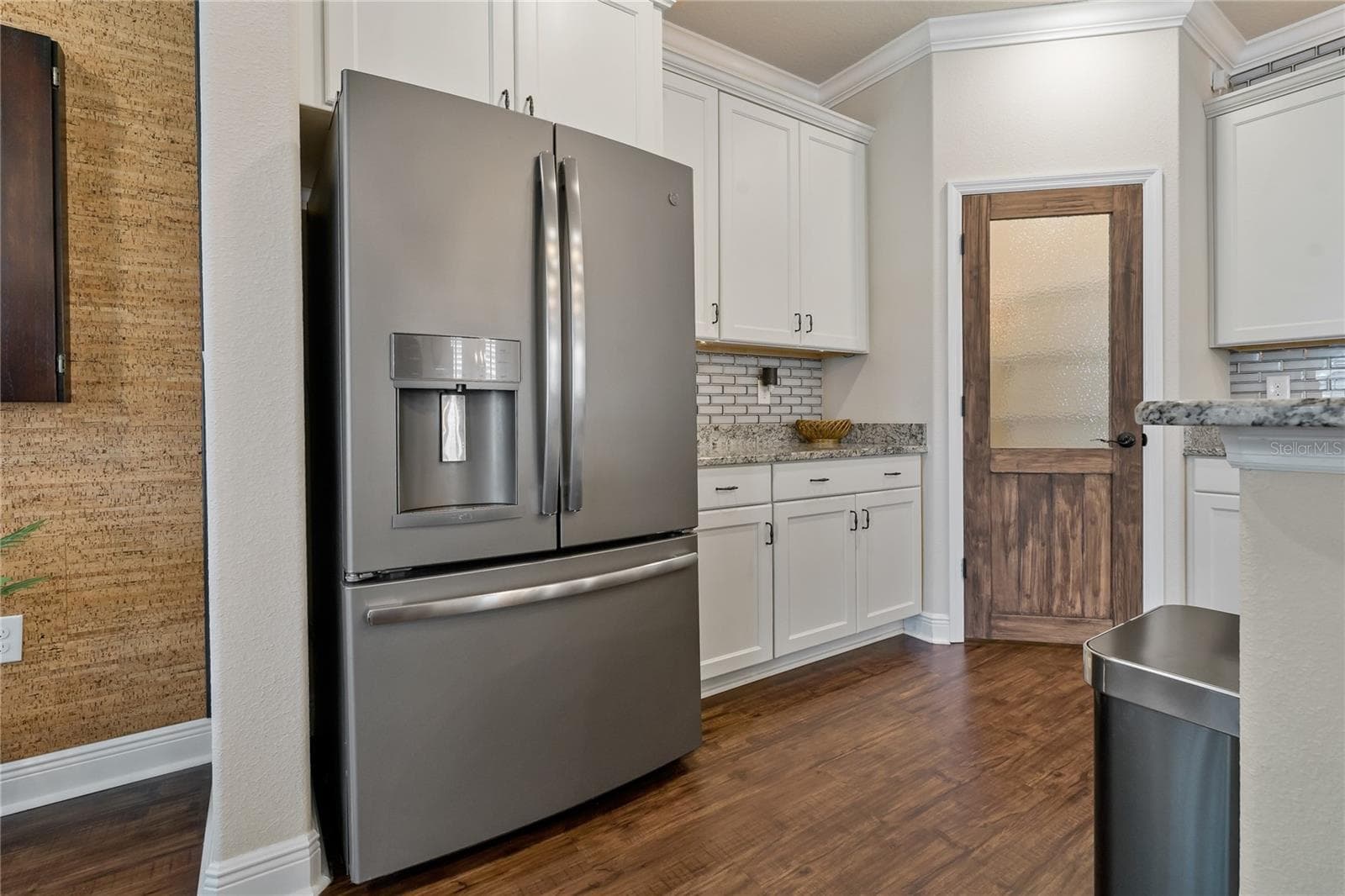 Walk-In Pantry with Custom Built Door - 597 OZONA VILLAGE DR, PALM HARBOR