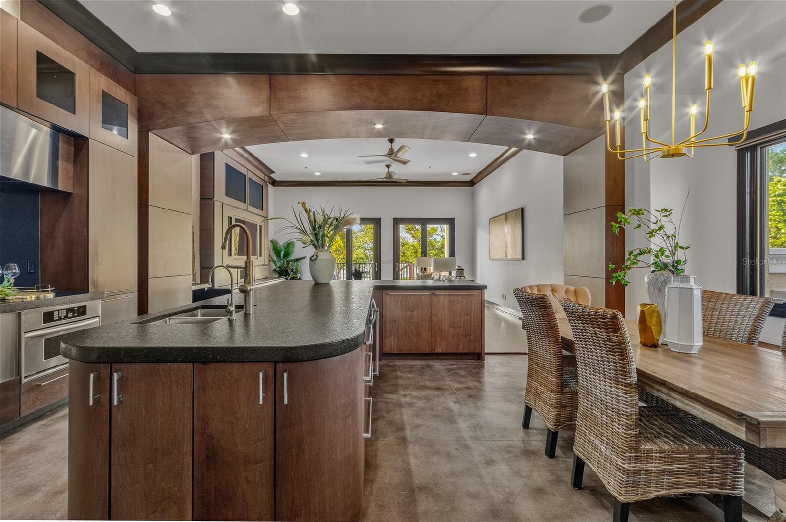 Expansive kitchen with luxury finishes and stained concrete floors. - 1008 PASEO DEL RIO NE, ST PETERSBURG