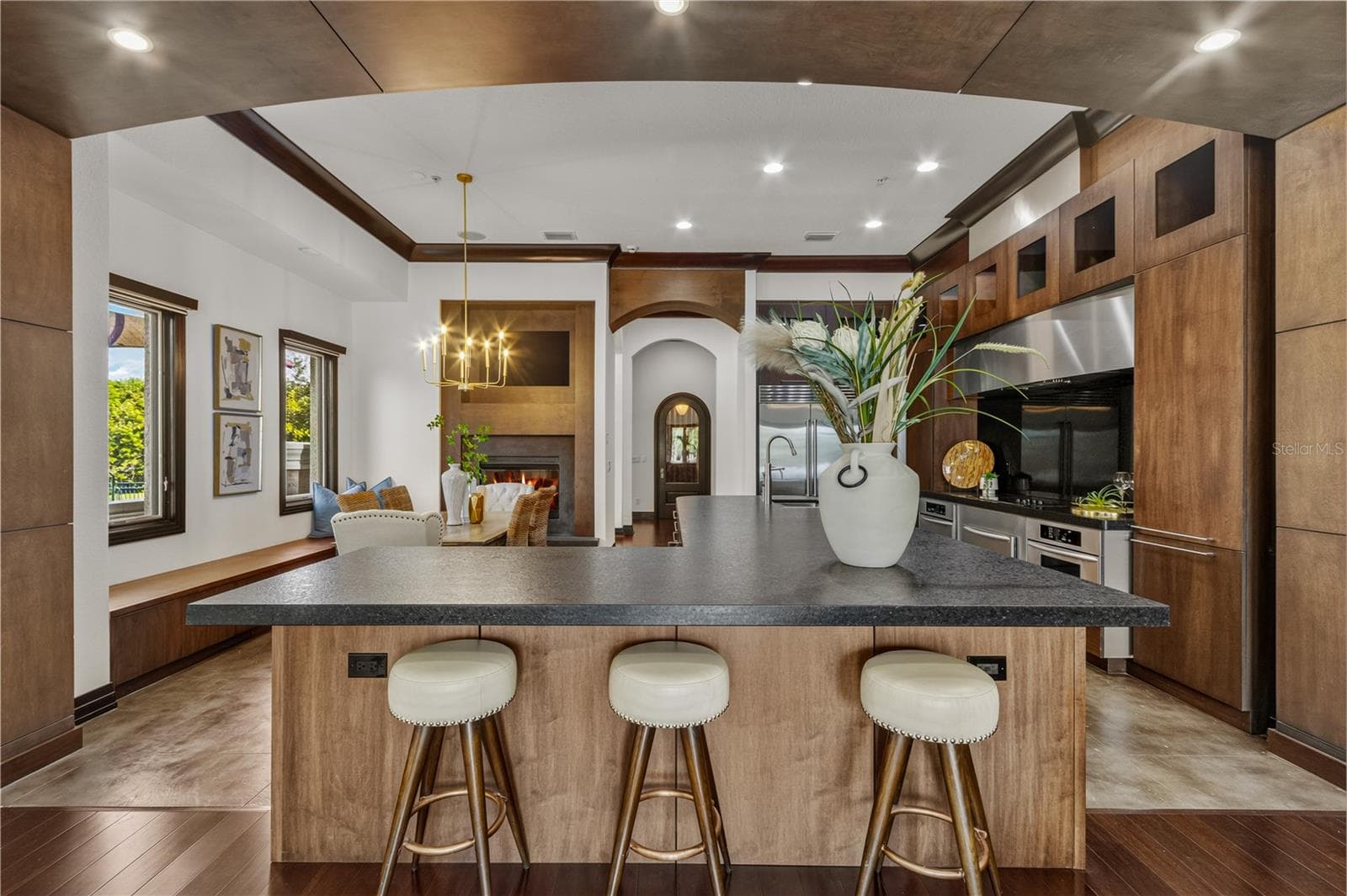 Eat-in bar and view of kitchen. - 1008 PASEO DEL RIO NE, ST PETERSBURG