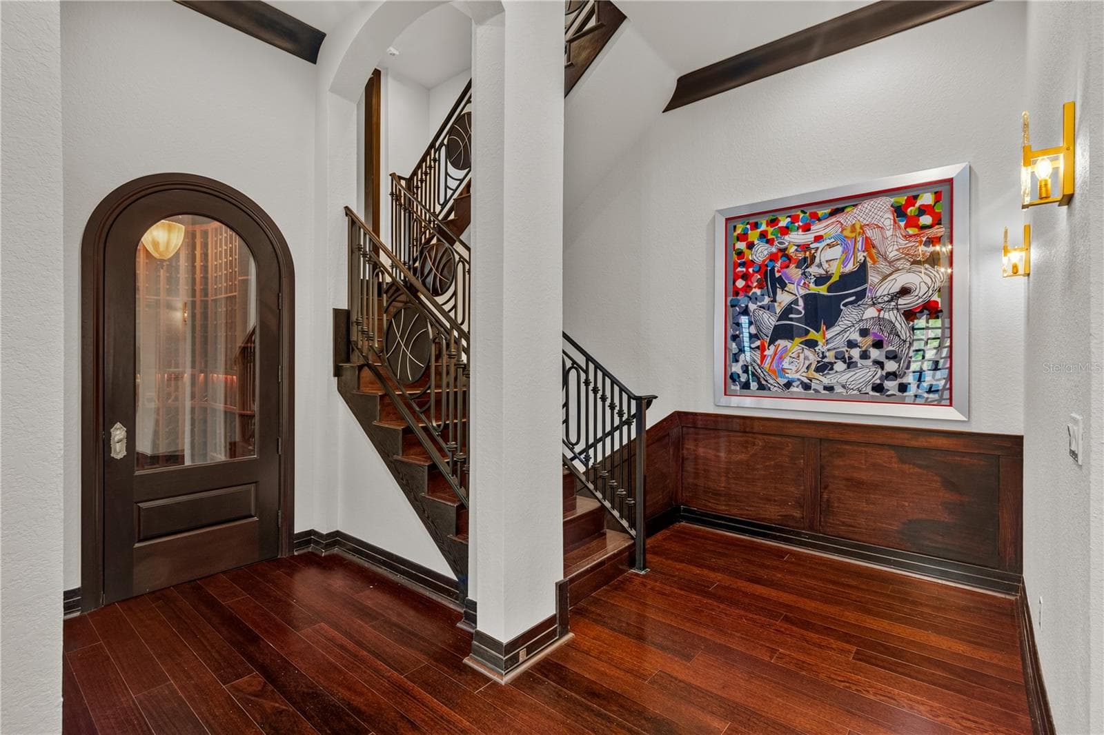 View of wine room to left and unique custom staircase to back left. - 1008 PASEO DEL RIO NE, ST PETERSBURG