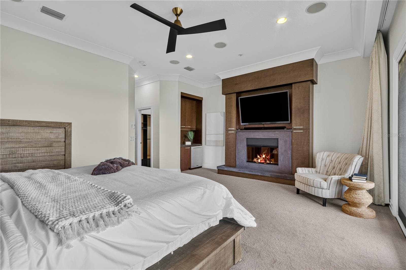 Master bedroom with fireplace and wet bar. - 1008 PASEO DEL RIO NE, ST PETERSBURG