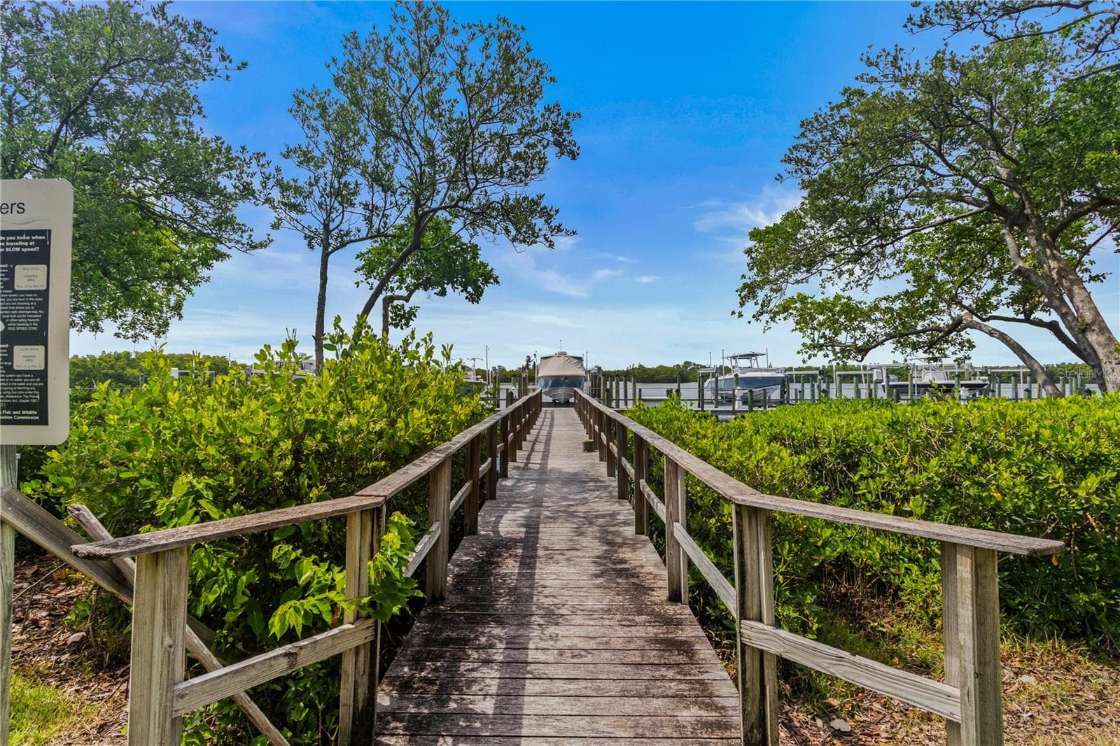 Community dock. This property comes with the boat slip at the far end of the dock. - 1008 PASEO DEL RIO NE, ST PETERSBURG