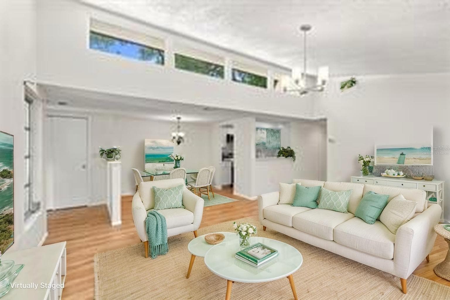 Living Room Virtually Staged - 6947 WOODWIND DR #77, SARASOTA