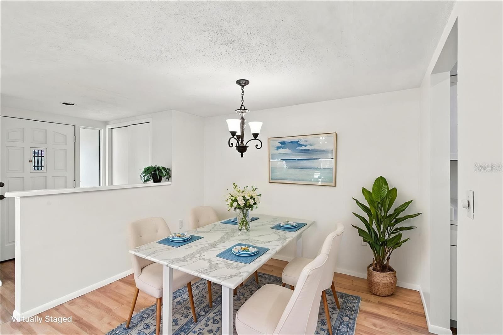 Dining Area Virtually Staged - 6947 WOODWIND DR #77, SARASOTA