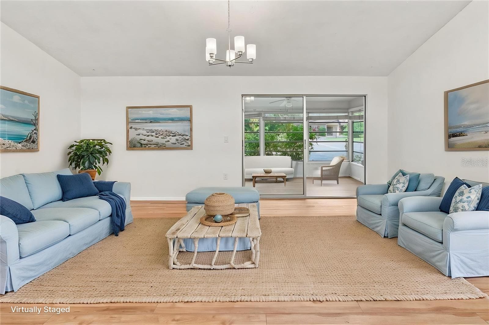 Living Room Virtually Staged - 6947 WOODWIND DR #77, SARASOTA