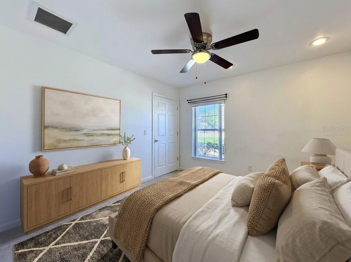 Virtually Staged Right Wing Bedroom #2 - 2300 PINE MEADOWS PL, CHULUOTA