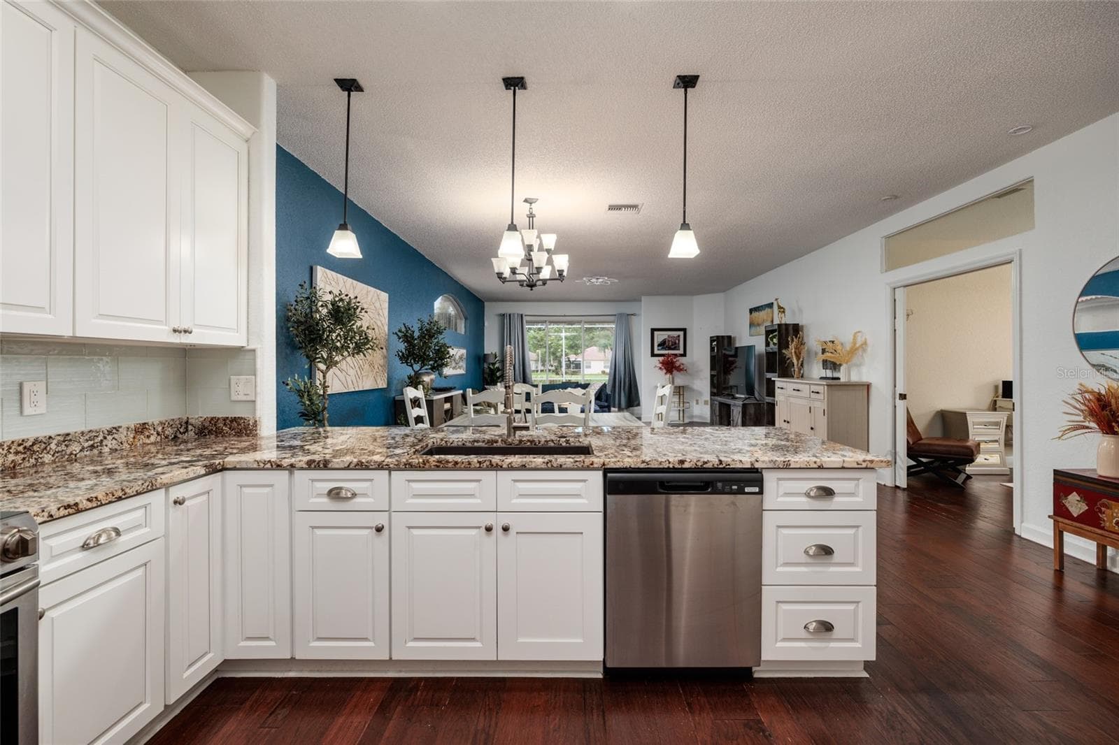 To the right is the den/3rd bedroom. - 1338 DARTFORD DR, TARPON SPRINGS